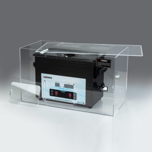 Otwarta skrzynka wyciszająca z ultradźwiękową myjką ASONIC o pojemności 3 l, ilustrująca konstrukcję redukującą hałas.
